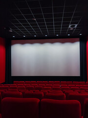 Cinema Screen  And Red Seats. Empty Screening Theater
