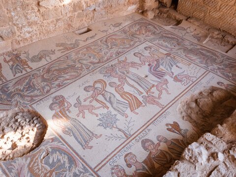 Mosaic in Hippolytus hall depicting Greco-Roman mythological figures and human life in Madaba