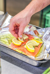 chef preparing food, salmon with lemon