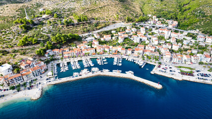 Amazing beach with boats against azure sea in Podgora, Makarska, Dalmatia, Croatian coast