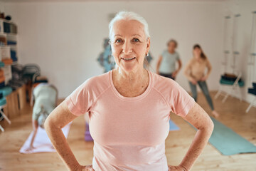 Portrait, senior woman and yoga class, wellness and coach, exercise and healthy lifestyle, workout and fitness studio. Happy pilates lady, yogi and trainer, group training and workout in retirement