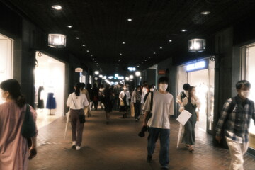 people walking in subway station