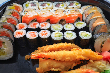 Colorful sushi set with pickled ginger and wasabi paste