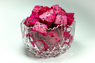 Red dragon fruit in a bowl