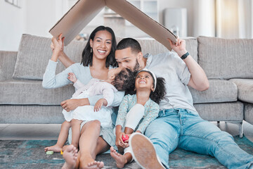 Happy family, cardboard roof or house life insurance in home living room floor in security, mortgage loan success or investment support. Property cover for smile, happy mother or father and children - obrazy, fototapety, plakaty