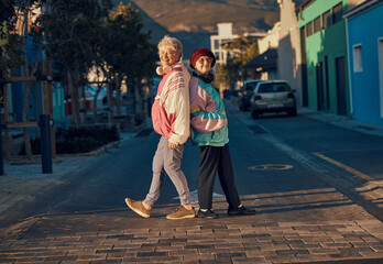 Senior woman, urban fashion and together in street for portrait, friendship or style outdoor....