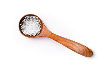 Natural sea salt in wooden spoon isolated on white background with clipping path.