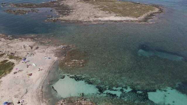 Aerial view of sea with emerald water surrounded by islands