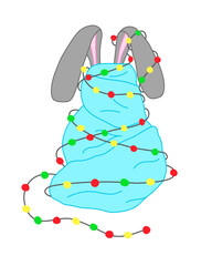A rabbit wrapped in a blanket and a Christmas garland.