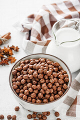 sweet crunchy chocolate children's breakfast chocolate balls on a white background