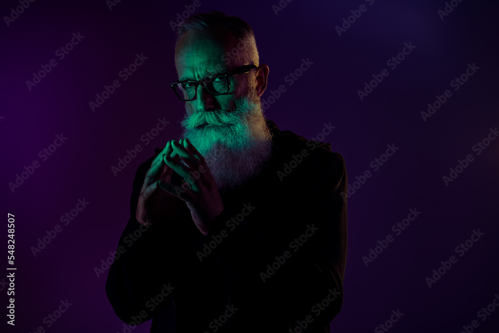 Poster photo of serious suspicious retired man dressed black pullover eyeglasses thinking how take ower wor