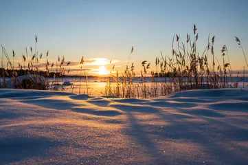 Fotobehang Sunset over the frozen sea. Fäboda, Jakobstad/Pietarsaari. Finland. © Sofie K