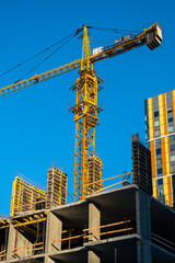Fototapeta na wymiar Construction of multi-storey modern buildings in the center of Yekaterinburg. 2022.