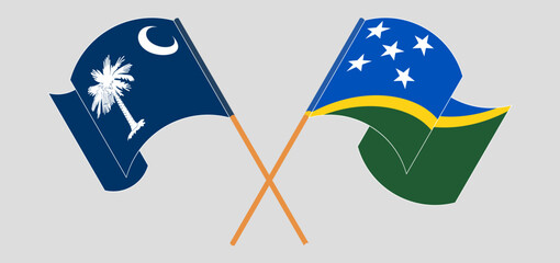 Crossed and waving flags of The State of South Carolina and Solomon Islands