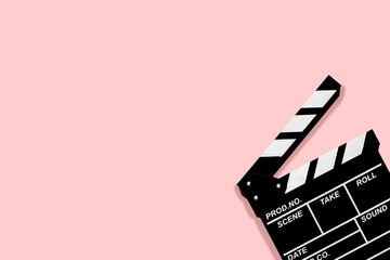 Fototapeta na wymiar Movie clapperboard for shooting videos and movies on a powdery background plenty of space for text