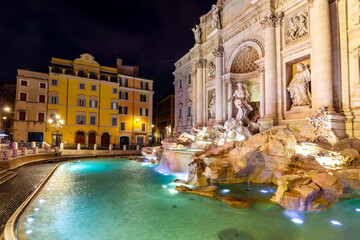 Naklejka na ściany i meble Famous Trevi fountain at night in Rome, Italy