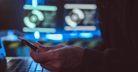 A hacker is stealing data from a computer.