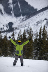 man snowboarder portrait on ski slope