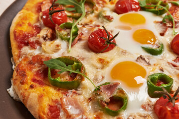 breakfast pizza with eggs, close up