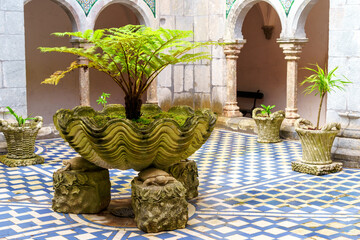 interior outdoor detail of an ornate planter pot