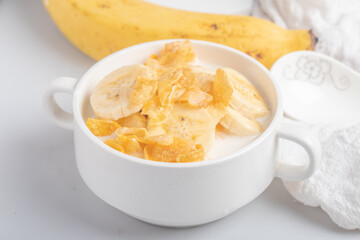 Cornflakes breakfast, banana, fresh milk, healthy food