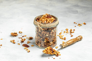 Bowl with granola on a light background. superfood concept. Healthy, clean eating. Vegan or gluten...
