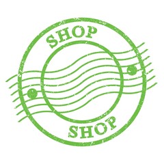 SHOP, text written on green  postal stamp.