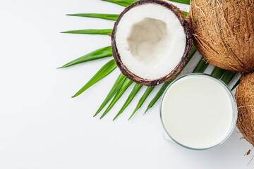 fresh natural coconut milk on a white acrylic background