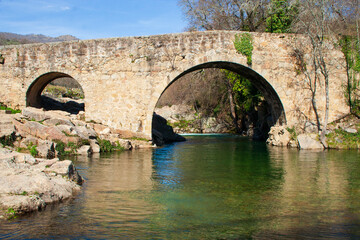 Fototapeta na wymiar The Roman Bridge of Madrigal de la Vera, Caceres, Extremadura, Spain Garganta de Alardos,
