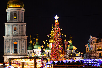 Fototapeta premium Main Christmas tree of Ukraine on St. Sophia Square, Kyiv. Celebration of the New Year Holiday near the New Year Tree.