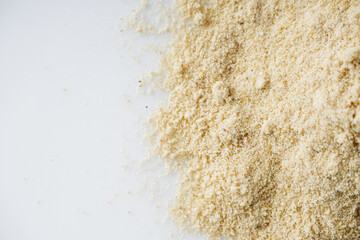 asafoetida aromatic powder on a white acrylic background