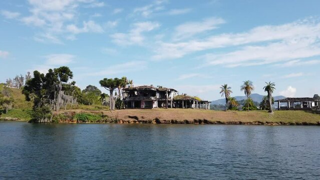 Colombia , South America 2022 - Guatape is a little village close to Medellin  tourist attraction - the lake and Pablo Escobar's villa destroyed by the Colombian police