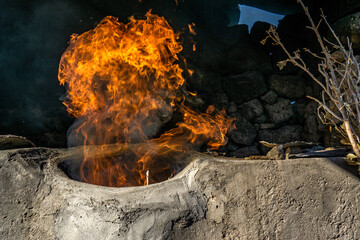 wood fire in a stone oven