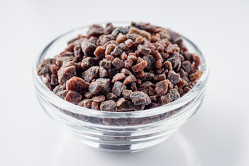 crystalline black Himalayan salt on a white background