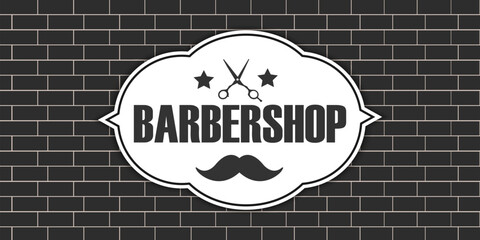 Vector image of a brick wall in close-up with a barbershop sign. A place for your text. The concept of beauty salons