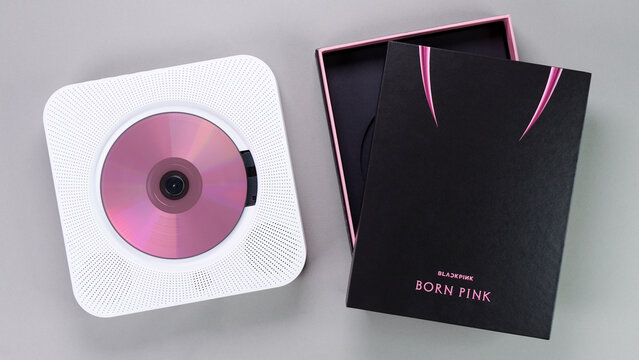 BlackPink BORN PINK 2nd Album Box set on grey with Pink music CD in retro player. Stylish CD album. South Korean girl group BlackPink. Gatineau, QC Canada - November 10 2022