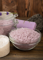 Obraz na płótnie Canvas Lavender flowers and fragrant sea salt, handmade soap and body cream. The concept of spa, beauty and health salon, skin care cosmetics. Natural cosmetics.Aroma procedures. Close-up on the background.