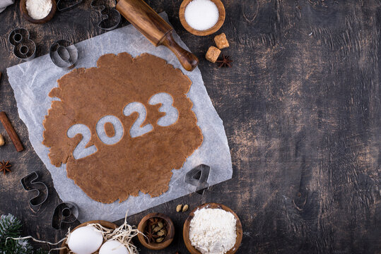 Gingerbread dough for cookies in shape of 2023