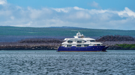 Fototapeta na wymiar A yacht moored in the waters of Galapagos Islands