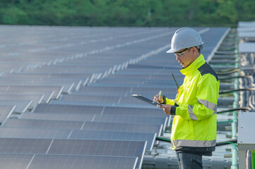 Asian engineer working at Floating solar power plant,Renewable energy,Technician and investor solar...