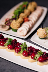 Serving of three different dishes on the table. Restaurant concept.