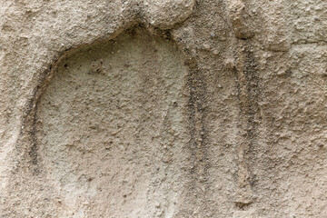The surface of the gray-beige sandy rock. Background. Space for text.