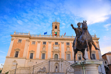 The Capitoline Hill in Rome, Italy: Statue of Roman Emperor Marcus Aurelius on horseback in front of the Palazzo Senatorio.