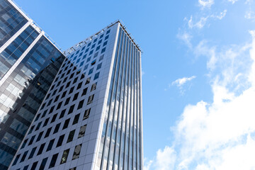 Fototapeta na wymiar Park Mall Hotel and Conference Center building against a blue sky.