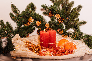 New Year's composition candle, dried fruit, Christmas tree. Christmas background