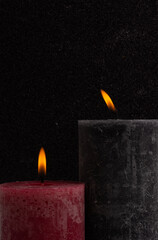 candles on a black background
