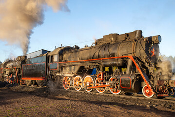 Old Soviet steam locomotive at the station