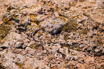 The texture of the stone. Abstract background. Uneven rough stones. Rock, mineral.
