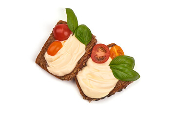 Toasted bread with cream cheese, isolated on white background.