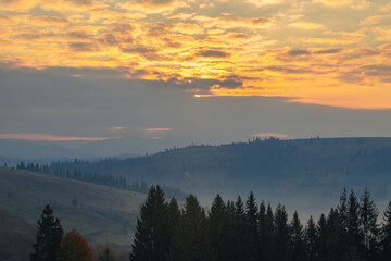A stunning sunrise in the mountains. The beautiful morning sky over the Carpathian mountain range.